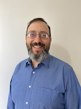 Headshot of Brian "bex" Exelbierd, July 2022